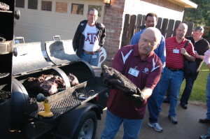 Dr. Jeff Savell showcases a beef brisket used as part of a teaching demonstration during Summer Barbecue Camp in College Station. (Texas A&M AgriLife Communications photo by Blair Fannin.)