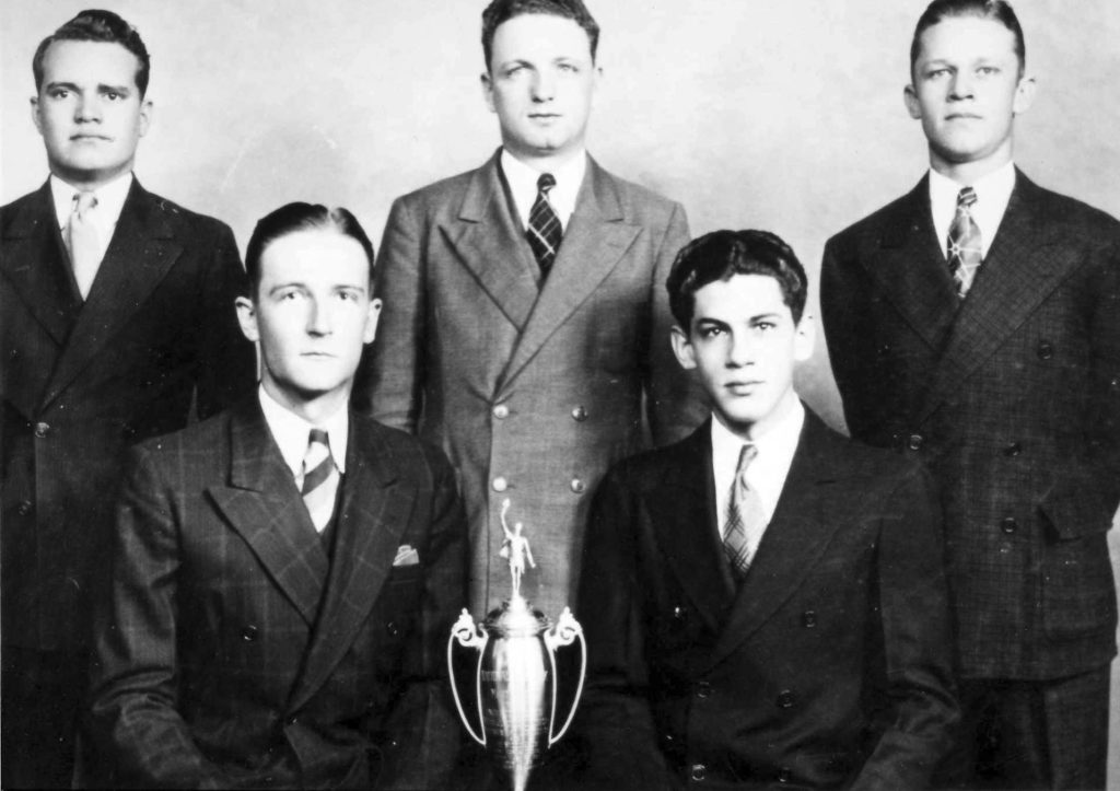 The 1st Fightin’ Texas Aggie Meat Judging Team was coached by Mr. Murphey in 1938. The team competed in the Southwestern: 1st and the American Royal: 3rd.