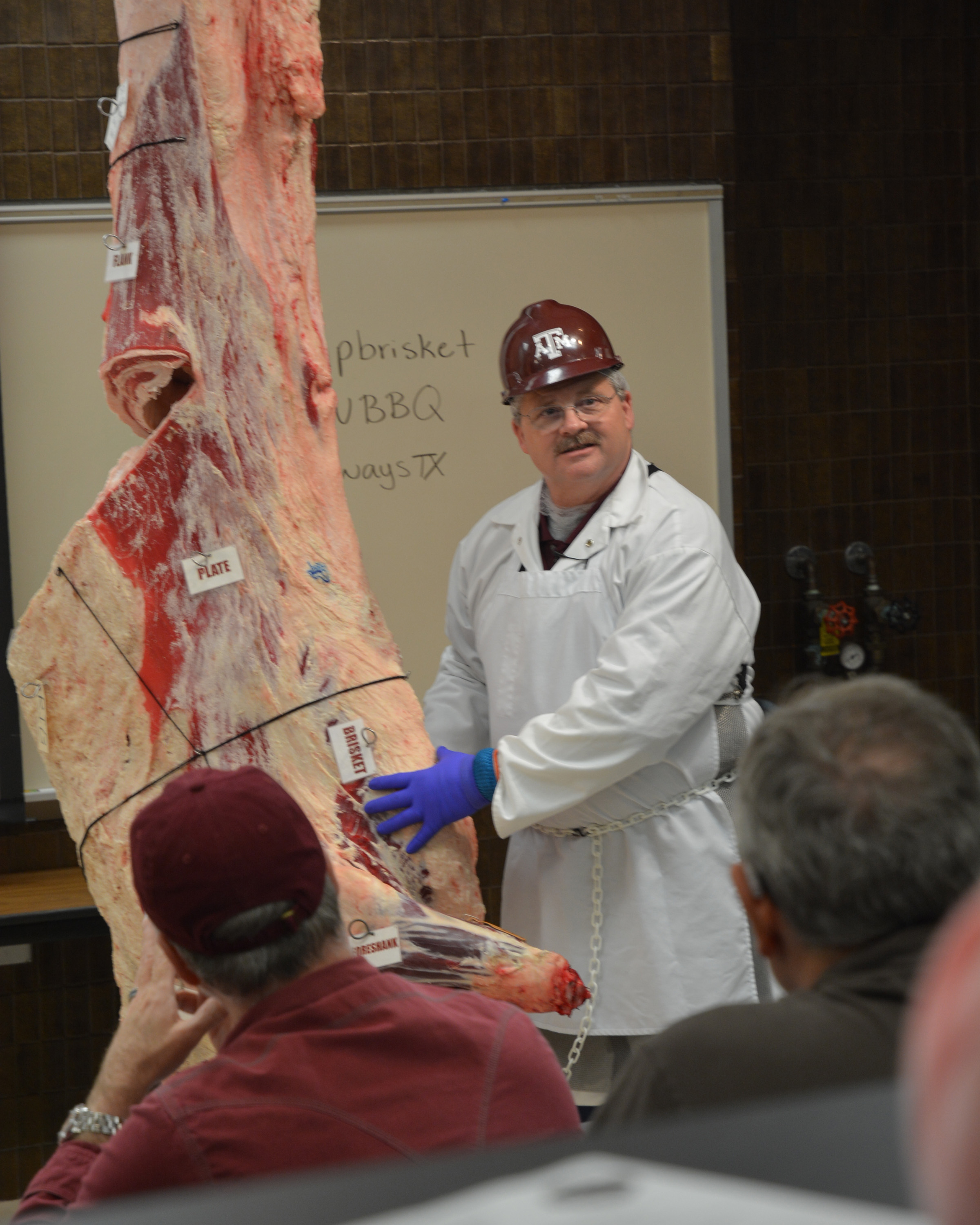 Dr. Davey Griffin discussing the anatomy of brisket.