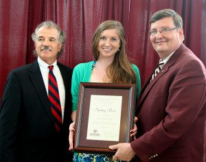 Sydney Reese with Drs. Dugas & Hussey after receiving her senior merit award.
