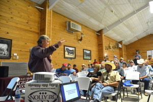 Stan Bevers, Texas A&M AgriLife Extension Service economist, Vernon, provides a cattle market update at the recent Rebuilding the Beef Herd program at Camp Cooley Ranch in Franklin. (Texas A&M AgriLife Extension Service photo by Blair Fannin)