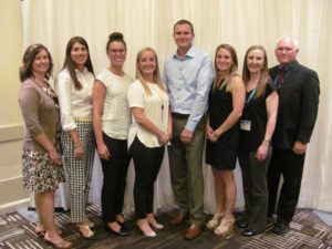 Some of Dr. Coverdale's grad students & colleagues with her husband, Mark Coverdale.
