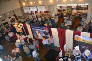 The trade show at the Texas A&M Beef Cattle Short Course features networking among industry vendors and cattle producers. (Texas A&M AgriLife Extension Service photo by Blair Fannin)