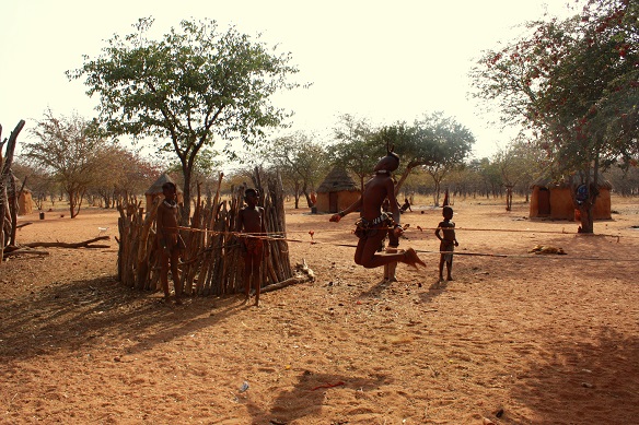 Himba childen playing jump rope. 