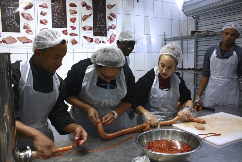 Making sausage at the butchery.
