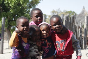Some of the children from the Ncamagoro village briefly stop playing to pose as we take their picture.