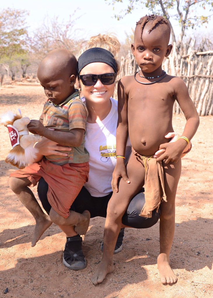 While visiting the Himba village I was able to spend time with some of the children. The boy on my right plays with Revile as the girl on my left holds my hand. 