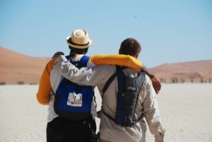 Raymond Thomas and Zeke McReynolds stroll through the sandy dunes of Sossusvlei, Namibia, after climbing Big Daddy.