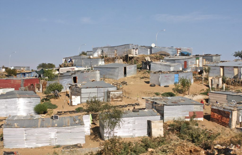 A group of aluminium shacks within Katutura Township. These shacks serve as a meagre form of shelter for residents of this town.