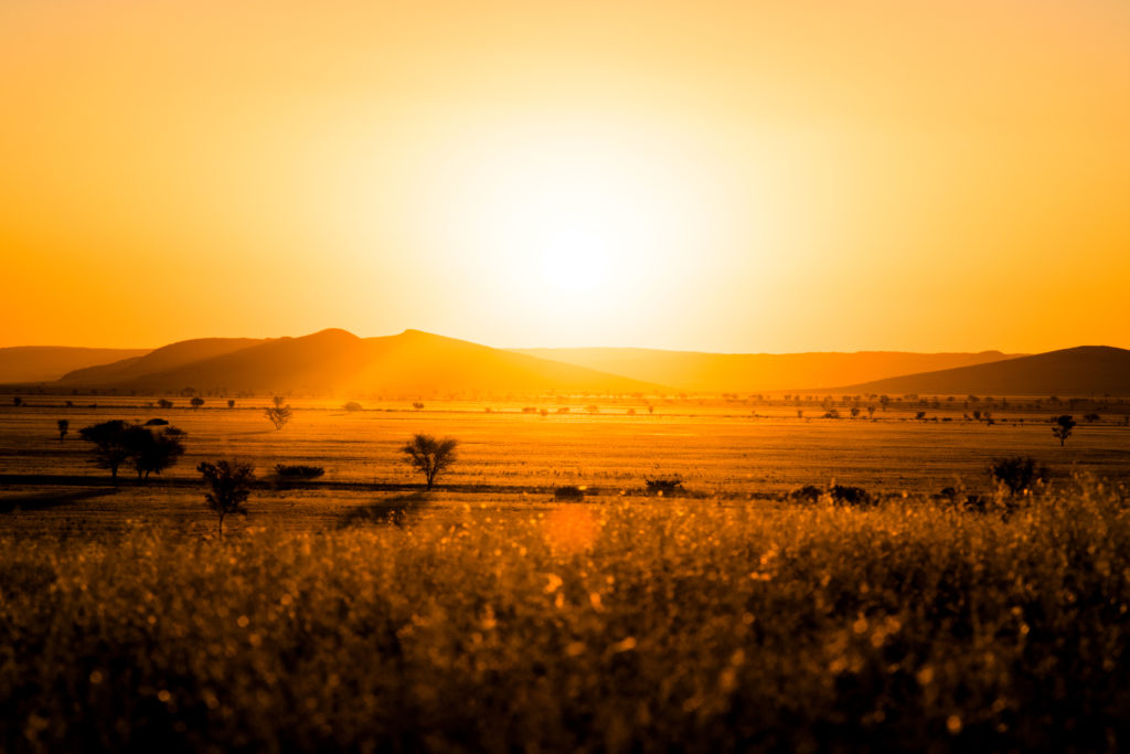 The sun sets on a beautiful landscape in Solitaire. That same sun that produces sunsets has the capability of producing enough solar energy to power Namibia.