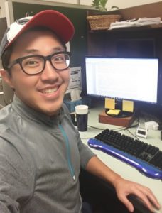 Dongmin Kim at a computer