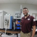 Portrait of Cory Klemashevich who is the Lab Manager of IMAC