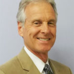 Portrait of Larry Dangott who is the Director of IMAC