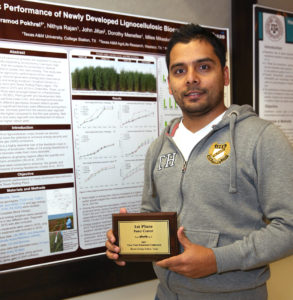 Pramod Pokhrel with his poster
