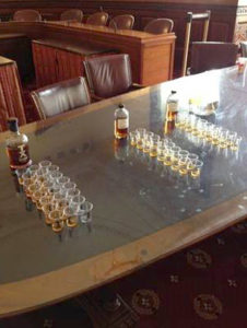 shots of whiskey lined up on a table