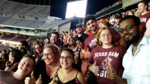 group of students in the football stadium